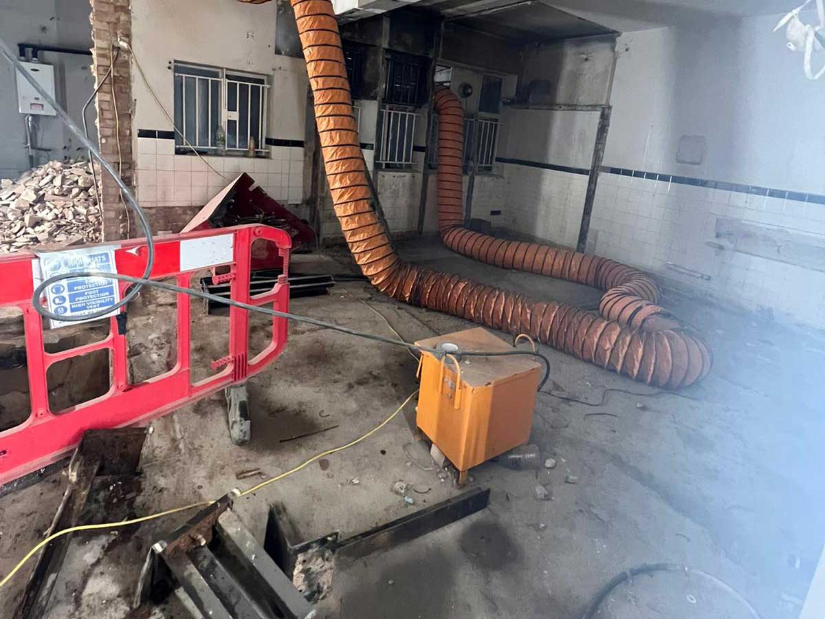 A room filled with various pipes, featuring a soft strip along the walls for added detail.